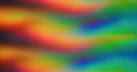 Blurred abstract glowing. Multicolored rainbow background. Defocused leak green yellow rays stripes...