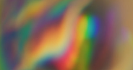 Prismatic background. Blurred bright colors. Defocused leak green yellow rays rainbow flickers gradient beam lens flare on abstract art light.の写真素材