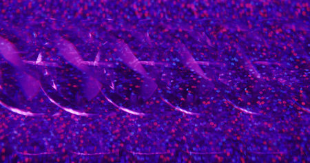 Blur confetti falling. Sparkle particles. Colorful purple transparent gleaming fragments turning on...