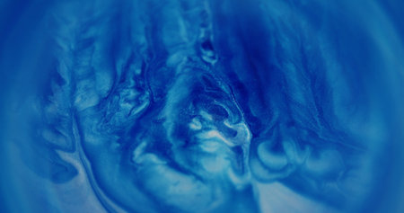Shimmer oil drops. Blur paint fluid. Blue white multicolor shimmering liquid ink gleaming water flow...