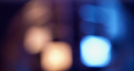 Bokeh color flare. Alternation spot. Appearance beam signal. Hypnotic spectral blinking. Gleamy accents changing background. Atmospheric shimmer.の写真素材