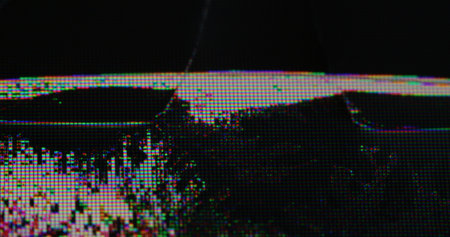 Glitch blur. Broadcasting problem. Broken screen grainy futuristic surface with glass cracks. Black shapeless wet shimmering dead spot.の写真素材