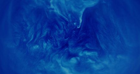 Blur glitter shimmering. Sparkling flow. Colorful white blue fluid blinking liquid paint ink bright dust moving on abstract bokeh light background.の写真素材