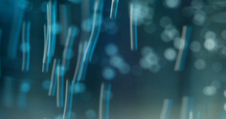 Bokeh pour beads. Scattering effect. Fast moving particles bokeh flare background with light spots....