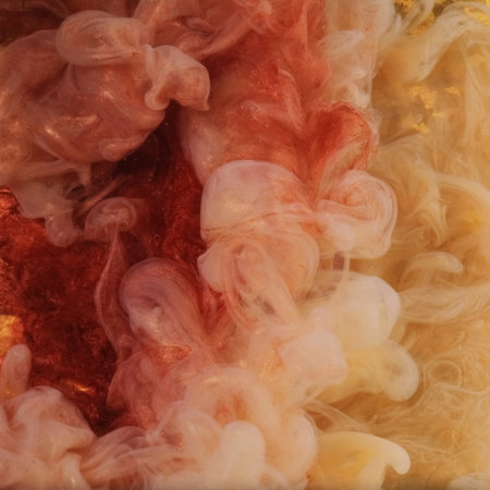 Paint splash water. Patterned background. Defocused yellow bronze color glowing ink smoke cloud texture haze on abstract art light.の写真素材