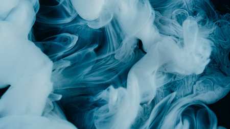 Ink steam. Smoke twirl. White whirl curl shape swirl fluid flow. Art color liquid cloud dye blend defocused abstract black background.の写真素材