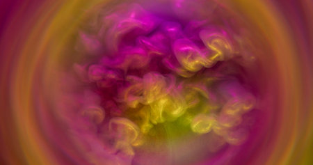 Art fluid. Paint haze. Pink purple golden sparkling dye wave explosion. Fantasy spill sand fog in...