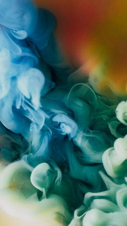 Underwater smoke. Art vapor. Colorful mist cloud twist flow on black background. Ink blend fume spread fantasy swirl abstract blur liquid curl.の写真素材
