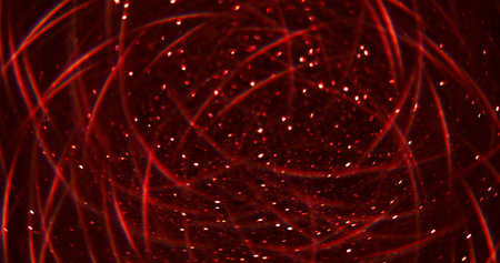 Blur glitter glow. Bokeh effect. Defocused shimmering light red color flash garland gleaming sparks...