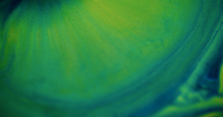 Smooth art. Defocused green wave. Sparkling colorful liquid water fluid turning on blurred abstract bokeh light modern background.の写真素材