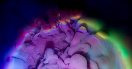 Iridescent wave. Smoke explosion. Colorful haze ink neon emerge spill on fluid surface. Fantasy...