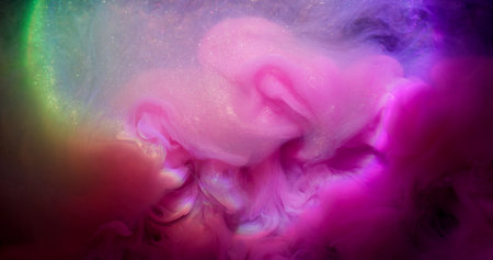 Iridescent glitter. Color smog. Art pink purple smoke neon ink smooth spilling with shimmering rainbow fluid. Fantasy blend blur dye water abstract background.の写真素材