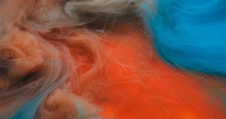 Cloud wave. Paint mix. Defocused orange blue color water texture chemical vapor acrylic liquid floating on abstract art background.の写真素材