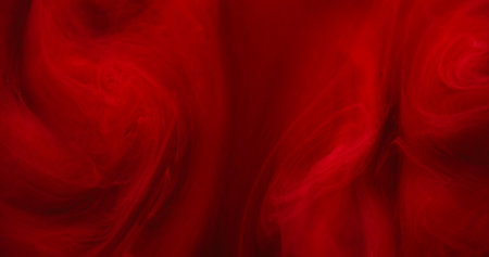 Cloud wave. Paint mix. Defocused red crimson color water texture chemical fog acrylic liquid spreading on abstract art background.の写真素材