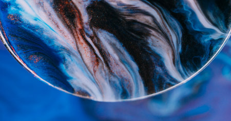 Spreading ink. Glitter color particles. Defocused white blue purple sparkling neon bubble bronze texture flow on abstract creative background.の写真素材