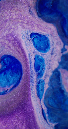 Paint drop. Splatter texture. Defocused blue purple pink colorful bright sparkling splash flowing on abstract creative art background.の写真素材