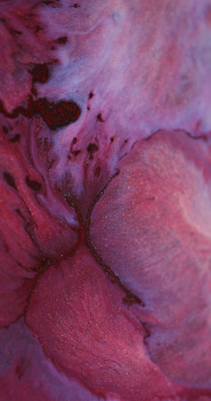 Ink mix. Spreading texture. Defocused pink red maroon color flowing purple liquid floating on...