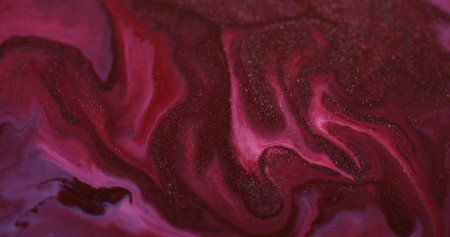 Spatter texture. Spreading ink particles. Defocused red blue color wet shiny bright liquid splash on vibrant acrylic art background.の写真素材