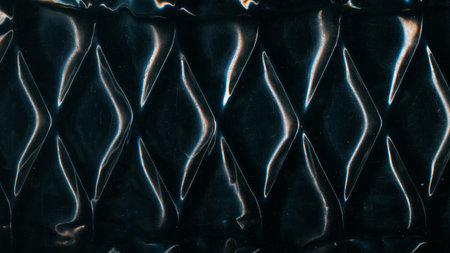 Metal uneven pattern. Old texture. Glossy steel diamond wave wall. Black distressed uneven old...