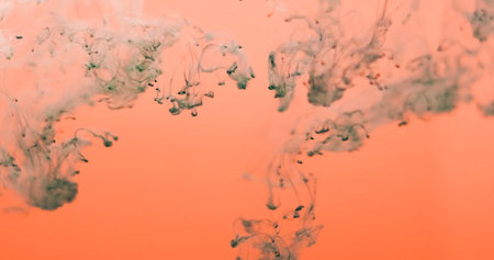 Ink vapor. Smoke blend. Gray fume paint drop curl stream in orange water. Art bright color abstract...
