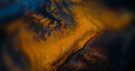 Blur glitter ink. Mix bokeh art. Defocused yellow golden blue colorful water texture liquid floating...