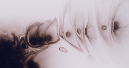 Liquid texture. Blur ink splatter. Defocused dark black water smear chemical fluid pigment floating...