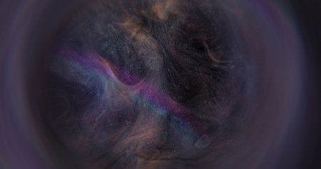 Glitter swirl cloud. Neon particles. Defocused purple blue color shimmer smoke texture on dark black...