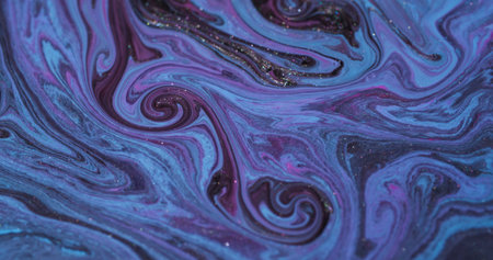 Ripple paint. Swirling flow. Blur blue pink purple colorful chemical sparkling pigment twirl fluid floating on abstract background.の写真素材