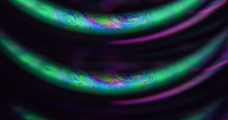 Defocused dye blend. Fluid. Green blue purple color ink dark black flow curve bubbles texture leak...