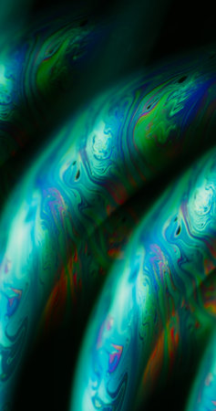 Blur emulsion spill. Acrylic ink. Blue orange green color flow oil bubble floating on abstract dark...