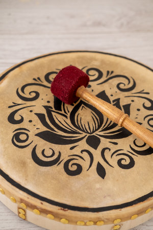 Tambourine sound therapy. Rhythm instrument. Tool for calming spiritual meditation wellness retreat for healing relaxing treatment.の写真素材