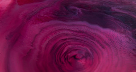 Defocused spreading paint. Color blob blot. Circle purple pink color explosion on acrylic...