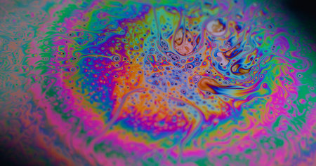 Defocused iridescent soap. Colorful ink blob. Circle neon spectrum liquid splash abstract...