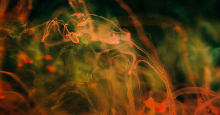 Fume drop blur. Paint vapor. Orange red green color blob underwater dissolving. Abstract swirl haze...
