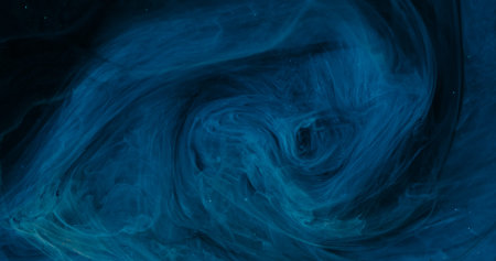 Ink mist. Swirl blue vapor. Defocused color glitter cloud splash sparkling liquid drop spreading on...