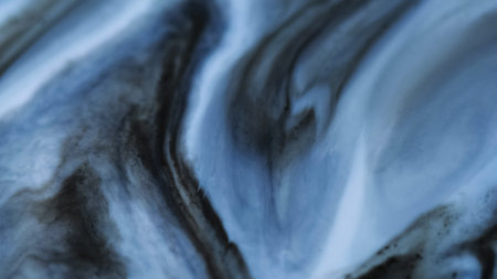 Blur marble paint. Flow texture. Blue purple color splash water pigment dye fluid bright acrylic liquid spill on abstract background.の写真素材