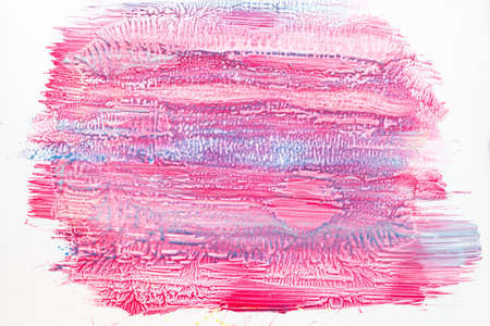 Pink nail polish background with blue smears. Bright varnish backdrop, manicure tool texture, free...