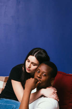 International Couple Man Woman Interracial Thoughtful Problem Serious Relationship Family Issue Hug...