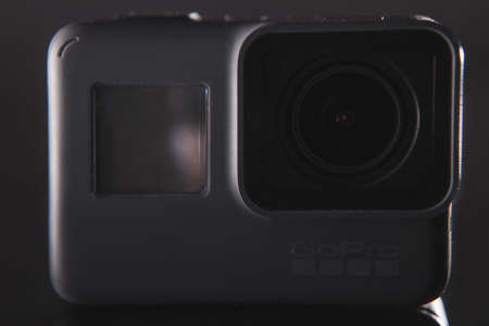 Kharkov, Ukraine - April 13, 2017: GoPro HERO 5 black edition digital action camera closeup. Compact gadget waterproof , support 4k video, voice controls and is often used in extreme photographyのeditorial素材
