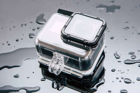 Kharkov, Ukraine - April 6, 2017: GoPro HERO 5 action camera in waterproof case under water flow. Compact gadget waterproof , support 4k video, voice controls and is often used in extreme photographyのeditorial素材