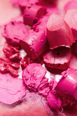Lipstick pink smeared samples closeup. Cosmetics commercial, creative advertising, bright colors. Beautiful style, glamorous magazine, beauty conceptの写真素材