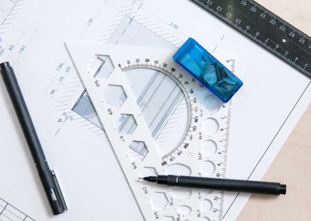 Drawing scheme and tools on desktop of architects workplaceの写真素材