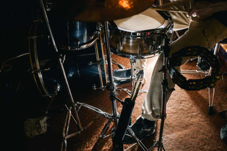 Drum kit during live concert closeup. Professional background. Atmospheric rock showの写真素材
