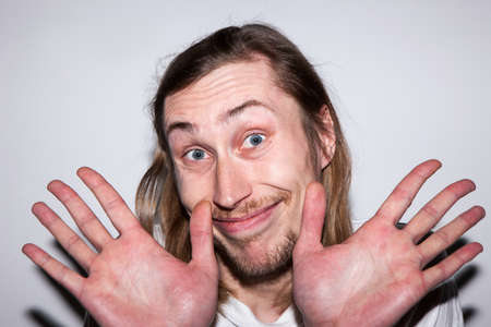 Innocent happy male. Deny involvement. Guiltless joyful man, freedom conceptの写真素材