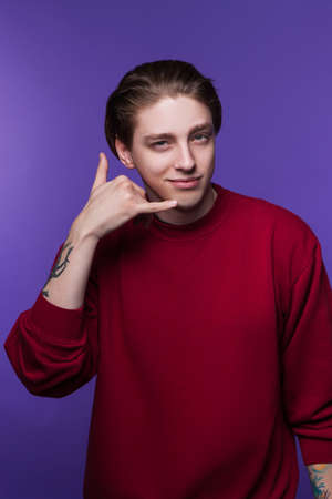 Young flirty male. Modern communication. Handsome playful boy asking phone number, youth love...