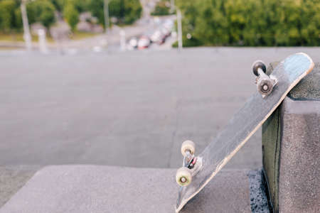 Skateboard closeup. Extreme hobby for young people. Urban street style, modern subcultureの写真素材