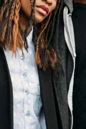 Stylish modern youth. Fashion life. Unrecognizable black people makeup, creative haircut, style...