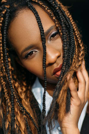 Black female portrait. Creative haircut. Young African American woman closeup, modern stylish youth, beauty conceptの写真素材