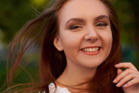 Joy and happiness. A successful woman, good day, pleasant conversation, sincere smile conceptの写真素材