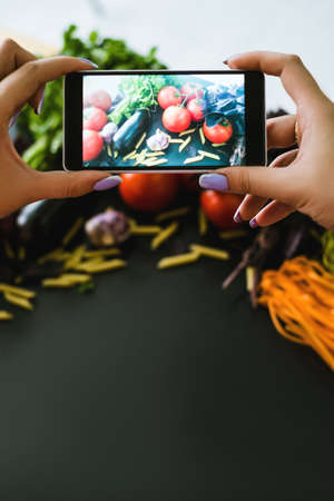 mobile food photography advertisment photo e-commerce technology conceptの写真素材